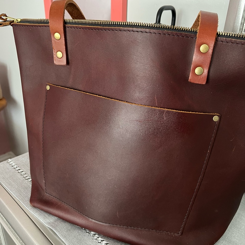 Portland Leather Tote in Deep Brown with tan straps. Zippered